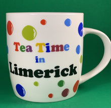Load image into Gallery viewer, An 11oz bone china  brightly colored polka dot mug that says Teatime in Limerick
