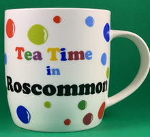 Load image into Gallery viewer, An 11oz bone china  brightly colored polka dot mug that says Teatime in Roscommon
