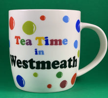 Load image into Gallery viewer, An 11oz bone china  brightly colored polka dot mug that says Teatime in Westmeath
