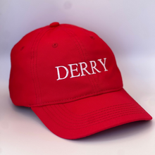 Load image into Gallery viewer, Red cap with &#39;DERRY&#39; embroidered in white on a red background
