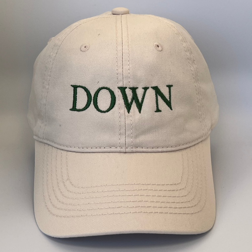 Beige cap with 'DOWN' embroidered in green on a beige background