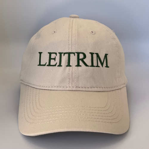 Beige cap with 'LEITRIM' embroidered in green on  a beige background