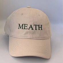 Load image into Gallery viewer, Beige cap with &#39;MEATH&#39; green embroidery on a beige background
