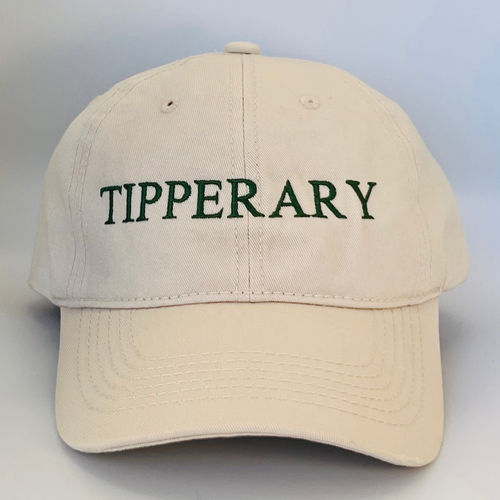 Beige cap with 'Tipperary' text  embroidered in green on a beige background