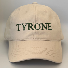 Load image into Gallery viewer, Beige cap with &#39;TYRONE&#39; embroidered in green on a white background
