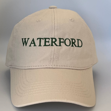 Load image into Gallery viewer, Beige cap with &#39;Waterford&#39; text  embroidered in green on a beige background
