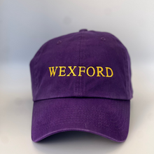 Load image into Gallery viewer, Purple cap with &#39;WEXFORD&#39; embroidered in yellow on a purple background

