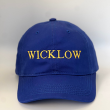 Load image into Gallery viewer, Blue cap with &#39;WICKLOW&#39; embroidered in yellow on a blue background
